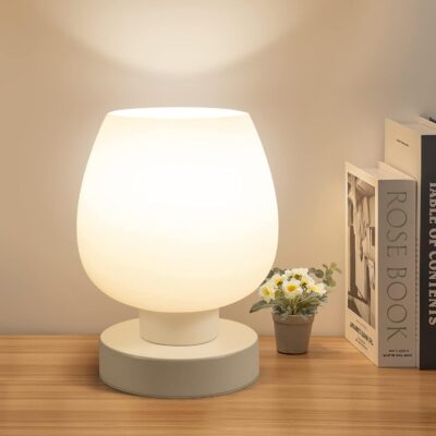 Touchscreen bedside lamp, compact.